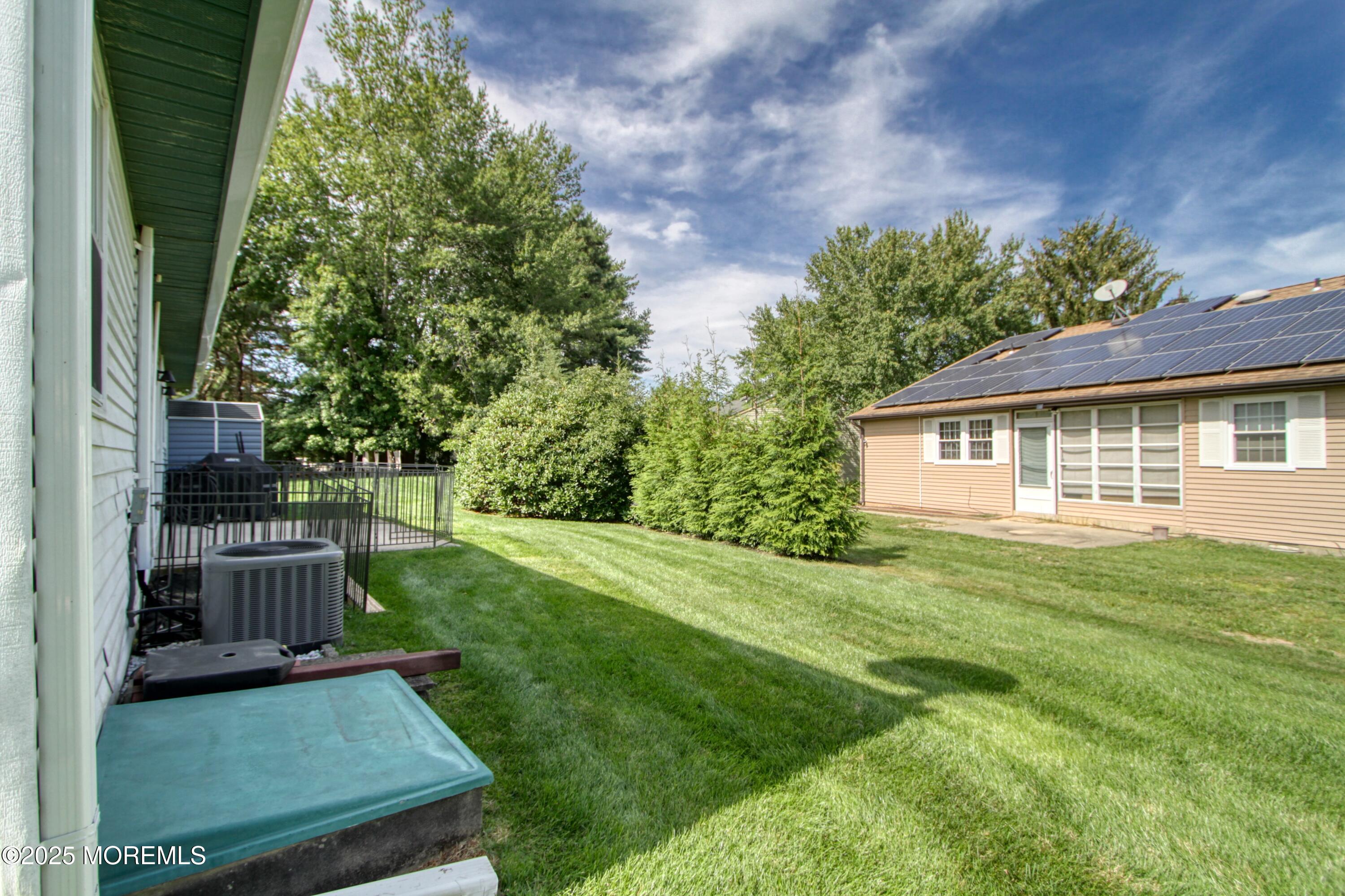 2 Norwood Court Whiting, NJ 08759 - Photo 14 of 22 a view of an house with backyard space and garden