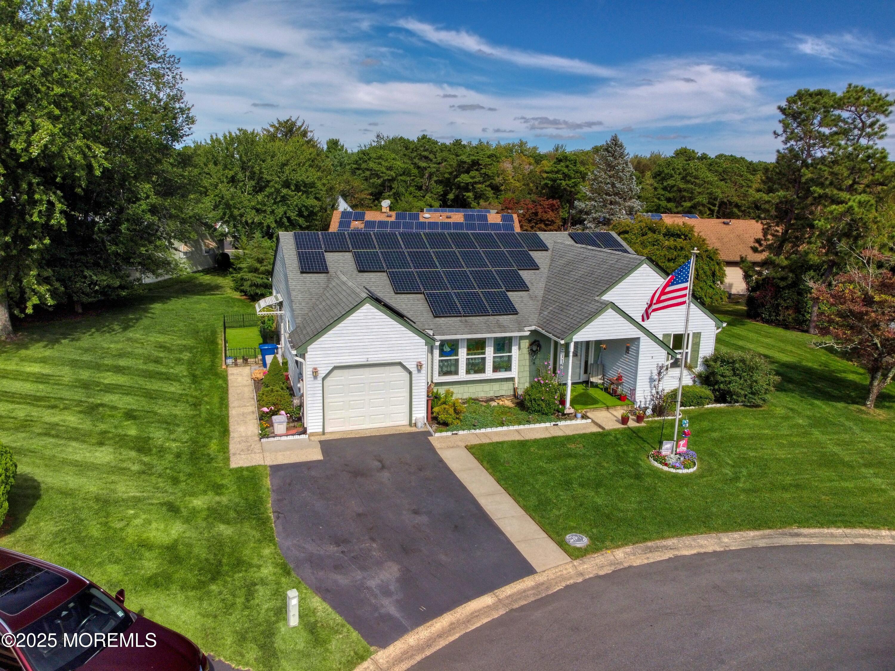 2 Norwood Court Whiting, NJ 08759 - Photo 19 of 22 a front view of a house with garden