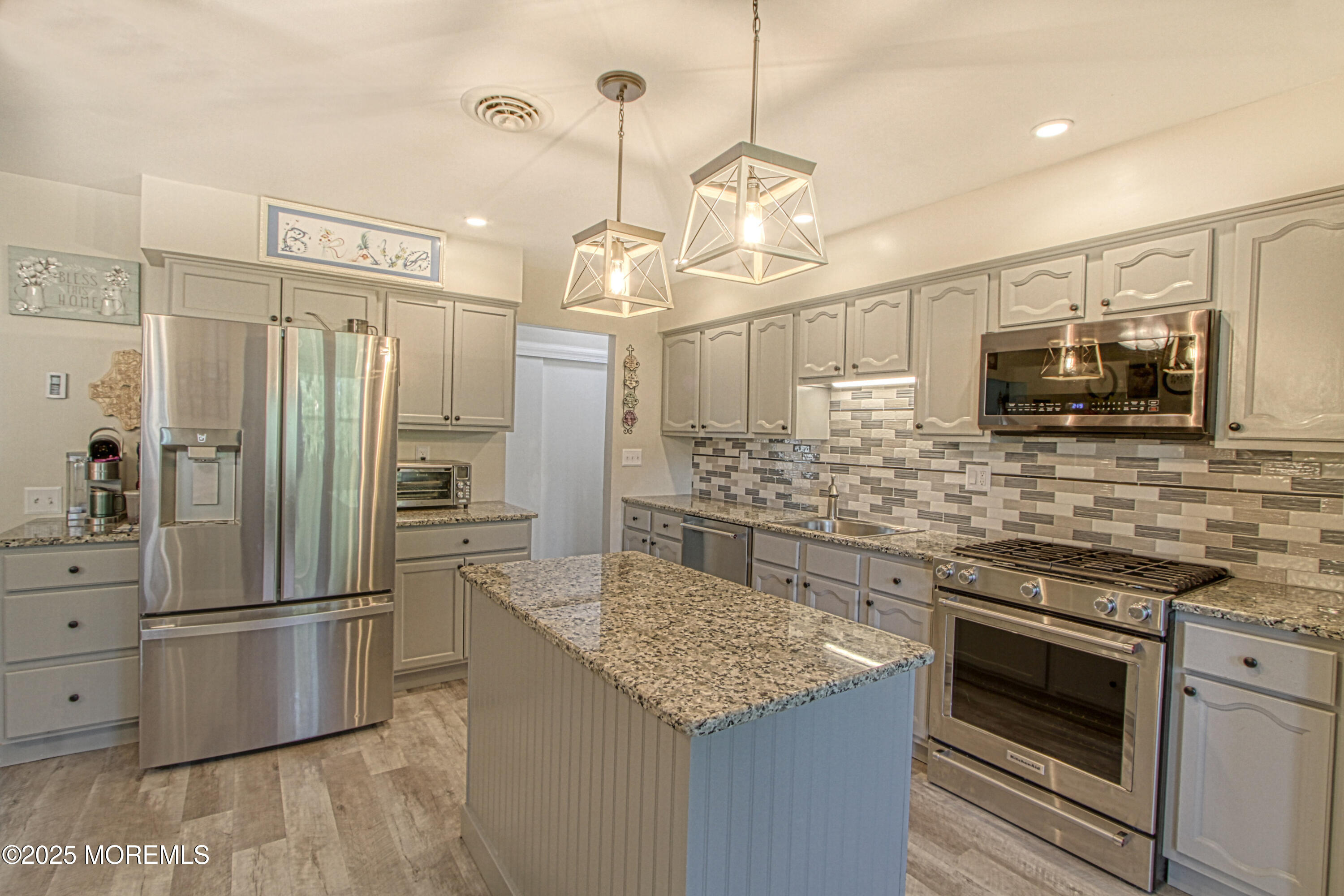 2 Norwood Court Whiting, NJ 08759 - Photo 2 of 22 a kitchen with stainless steel appliances granite countertop a refrigerator a stove and a sink
