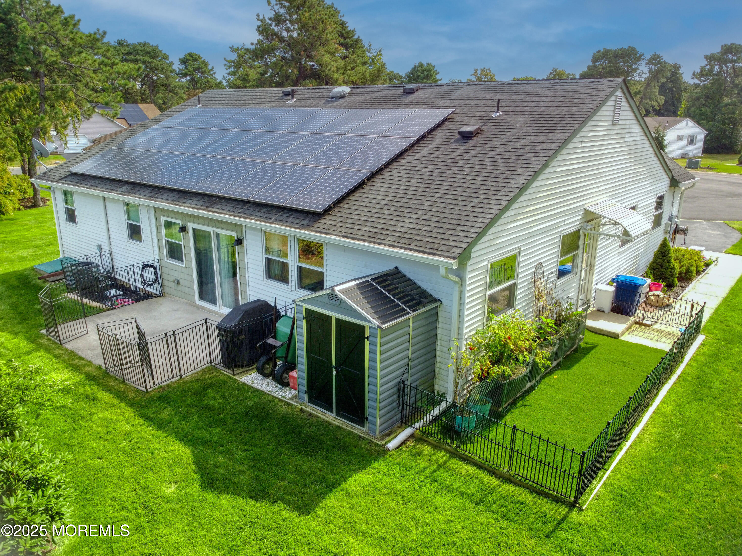 2 Norwood Court Whiting, NJ 08759 - Photo 22 of 22 a view of house with backyard and a garden