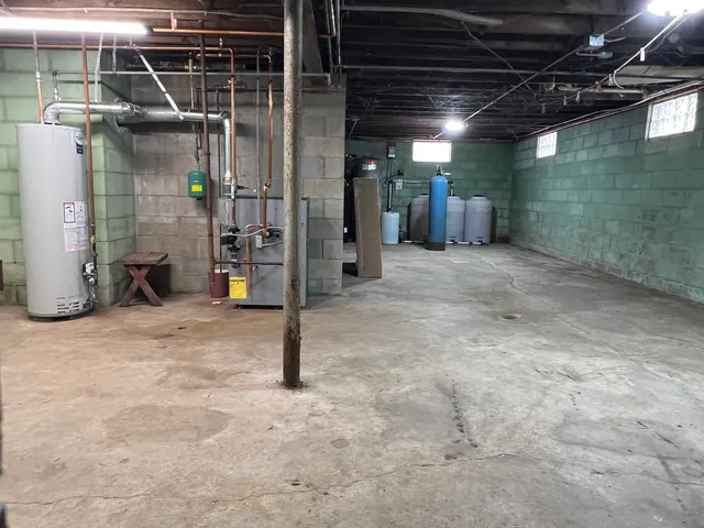 a kitchen with a stove and a refrigerator