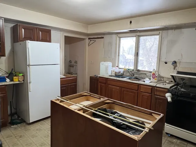 a room with furniture and a fireplace