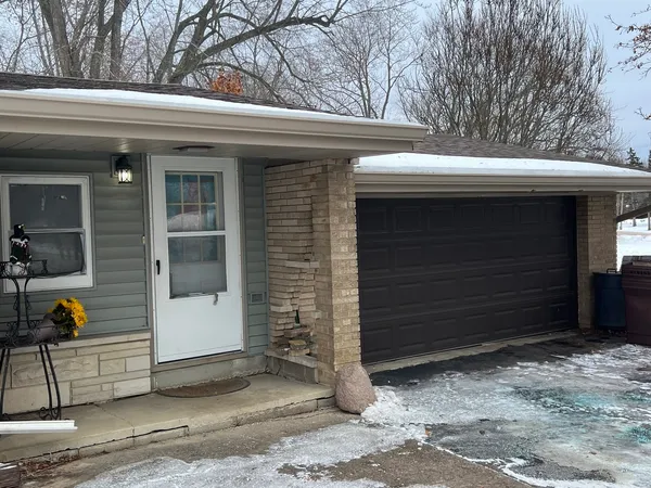 a view of outdoor space and garage
