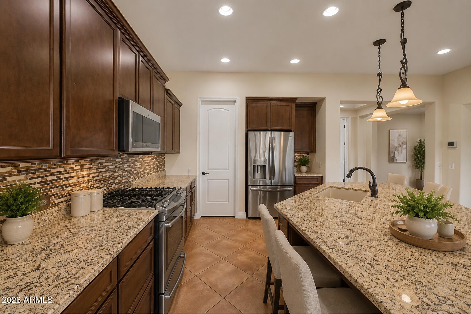 16819 West Coronado Road Goodyear, AZ 85395 - Photo 5 of 51 Coronado kitchen side