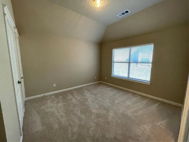 a view of a bathroom with a glass door