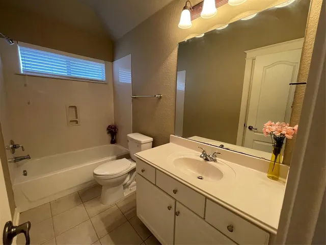 a view of backyard with outdoor seating