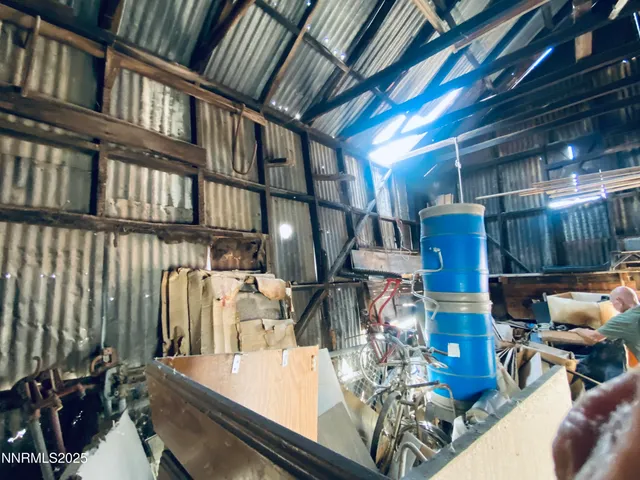 a view of a chairs and table in a patio