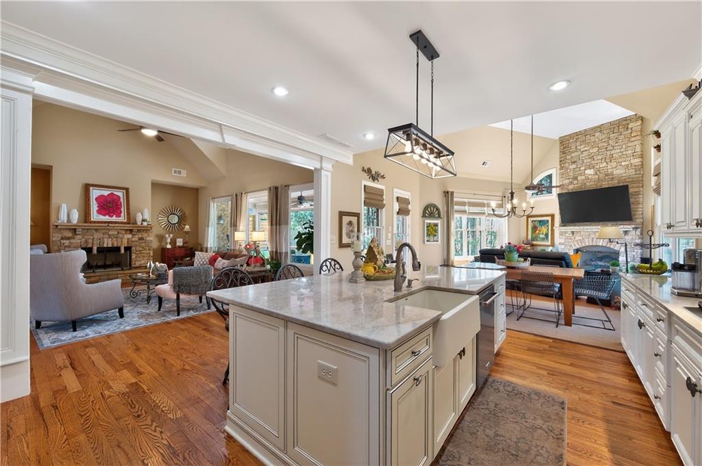110 Roxbury Row Alpharetta, GA 30004 - Photo 11 of 45 a view of living room kitchen with stainless steel appliances granite countertop living room and living room view
