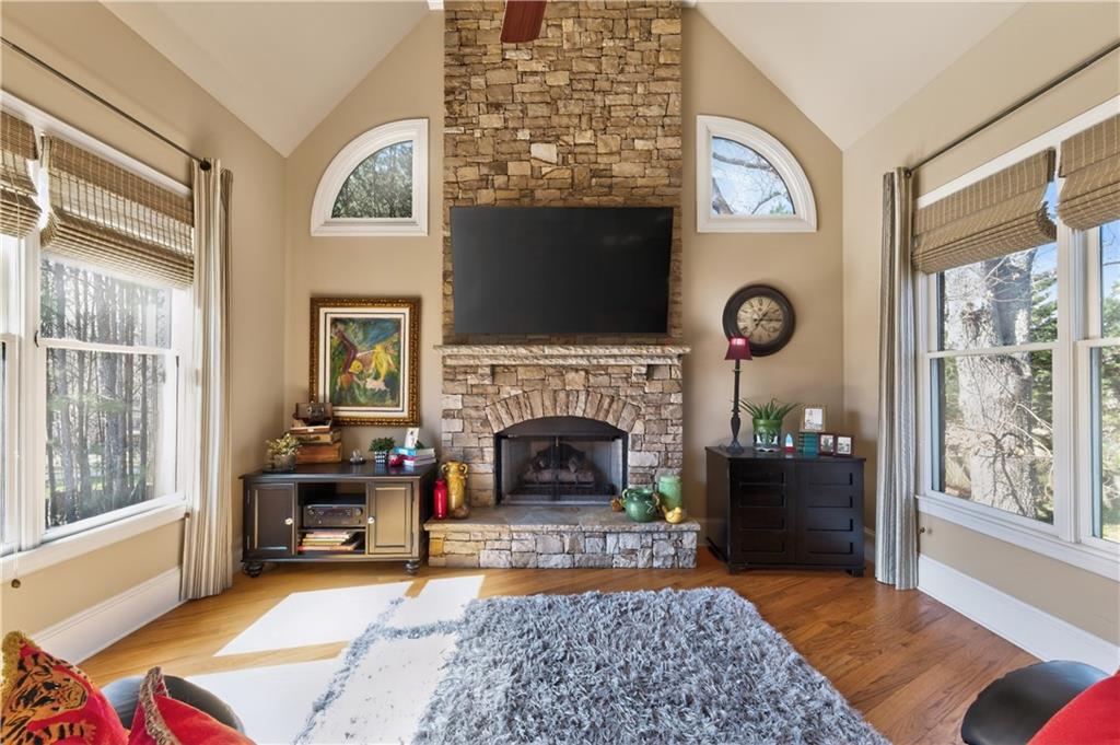 110 Roxbury Row Alpharetta, GA 30004 - Photo 13 of 45 a living room with furniture and a fireplace
