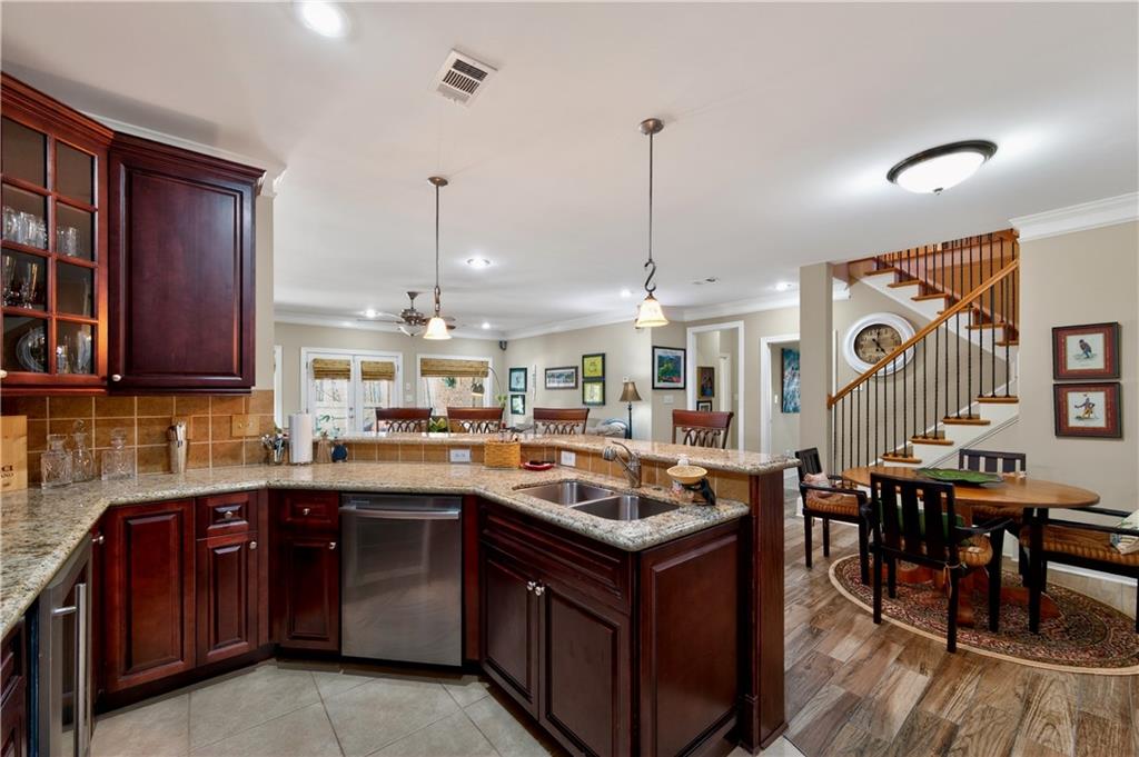 110 Roxbury Row Alpharetta, GA 30004 - Photo 24 of 45 a kitchen with lots of counter top space