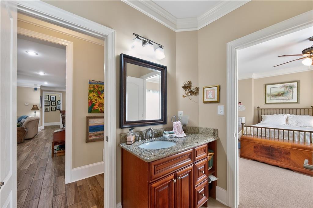 110 Roxbury Row Alpharetta, GA 30004 - Photo 29 of 45 a bathroom with a sink and a mirror