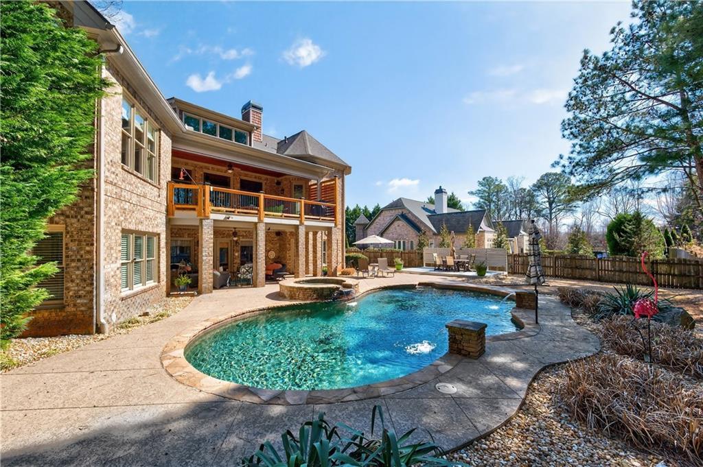 110 Roxbury Row Alpharetta, GA 30004 - Photo 33 of 45 a view of a house with pool and sitting area