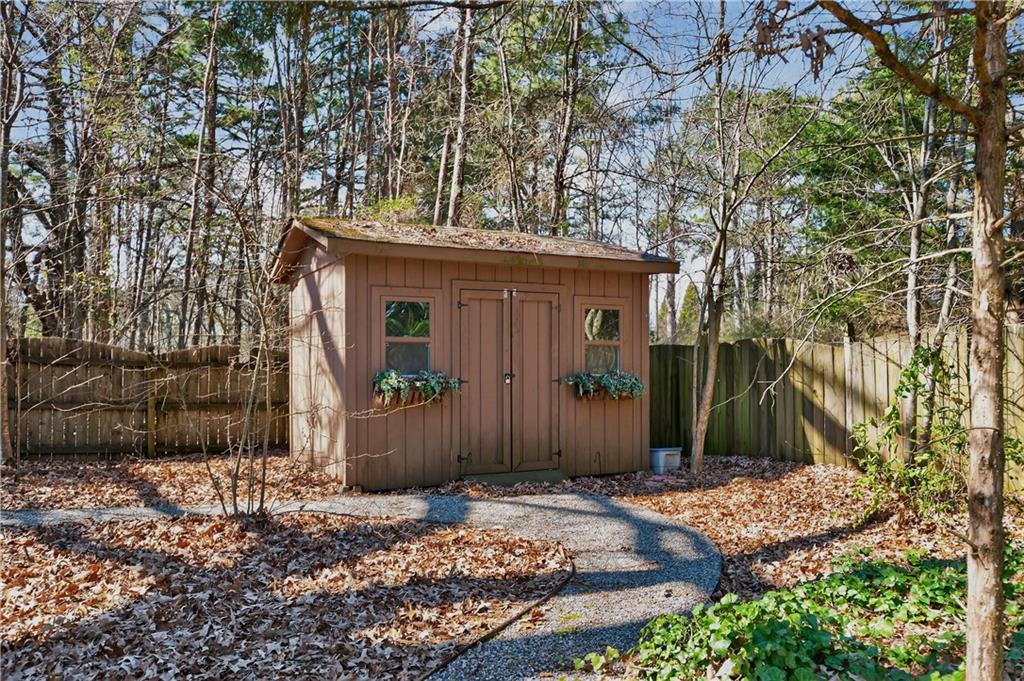 110 Roxbury Row Alpharetta, GA 30004 - Photo 38 of 45 a front view of a house with a yard