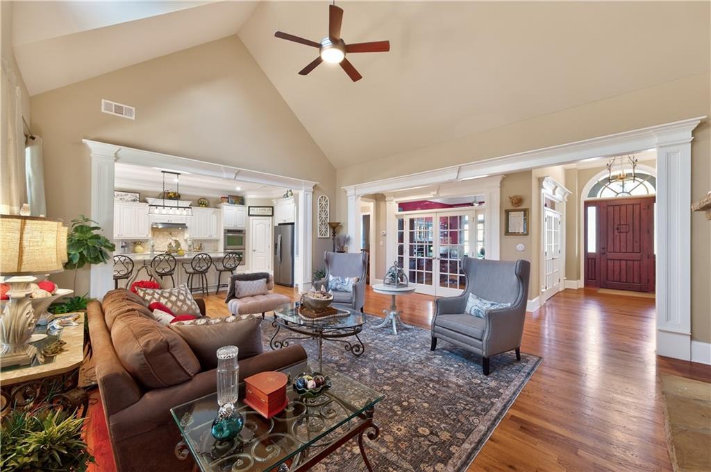 110 Roxbury Row Alpharetta, GA 30004 - Photo 5 of 45 a living room with furniture or couch and a window