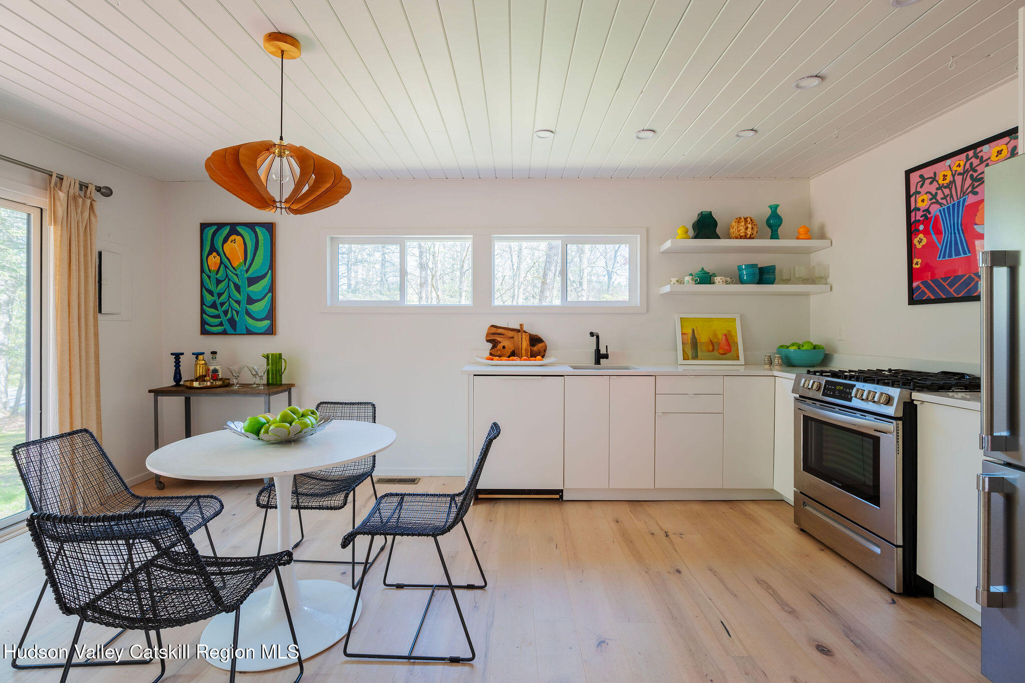 25 Upper Cherrytown Road Kerhonkson, NY 12446 - Photo 6 of 29 a view of a dining room with furniture and wooden floor