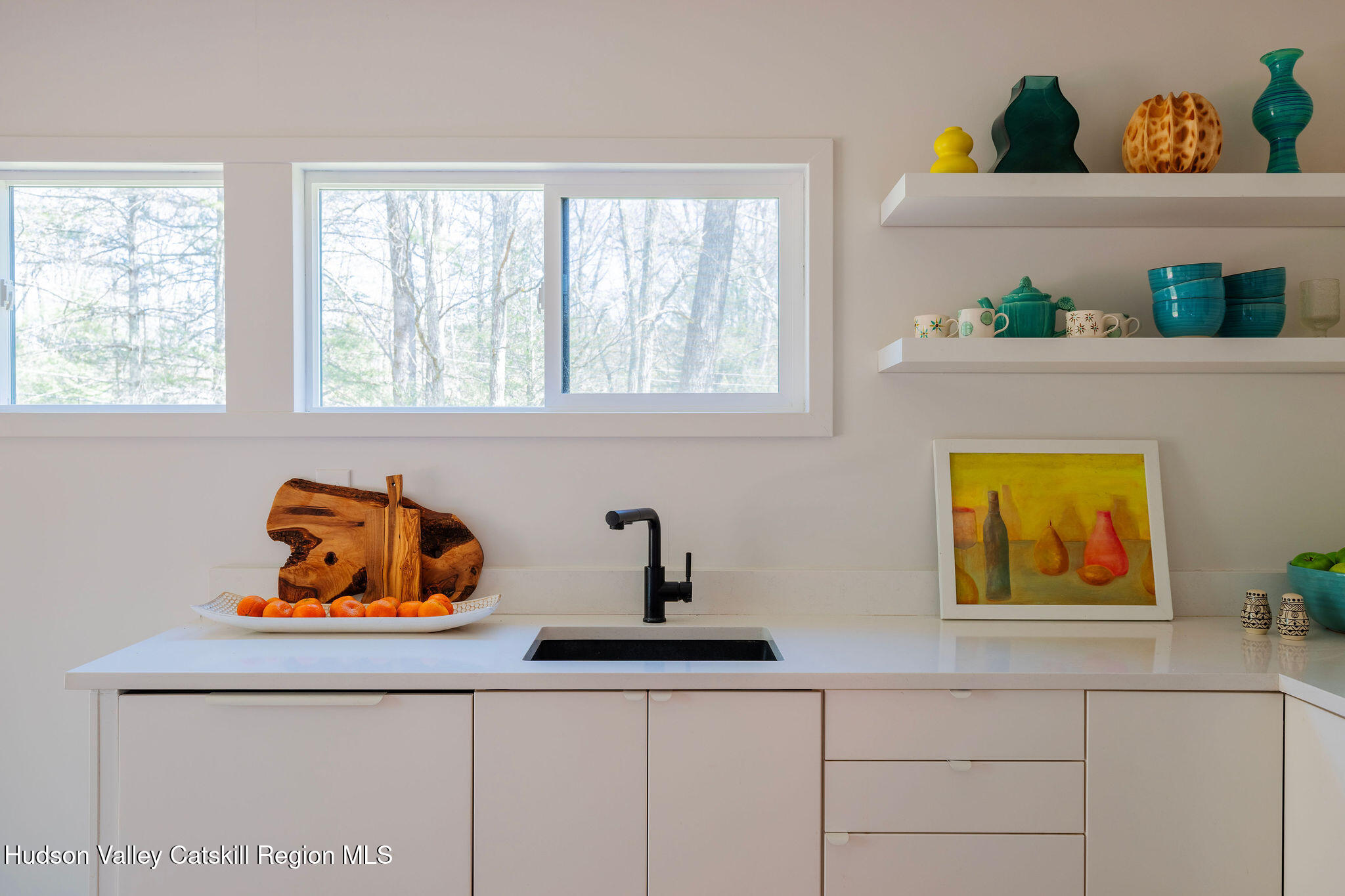 25 Upper Cherrytown Road Kerhonkson, NY 12446 - Photo 7 of 29 a kitchen with a window a sink and cabinets