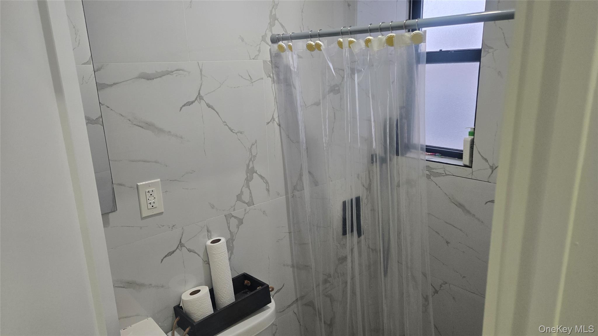 1008 Lenox Road Brooklyn, NY 11212 - Photo 10 of 13 Bathroom with a marble finish shower
