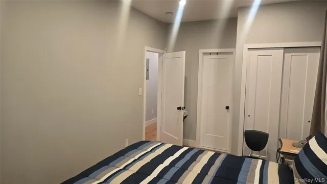 a view of room with wooden floor