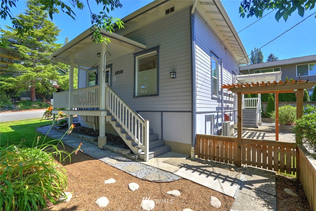 18518 103rd Avenue Northeast Bothell, WA 98011 - Photo 2 of 31 a view of a house with backyard and porch