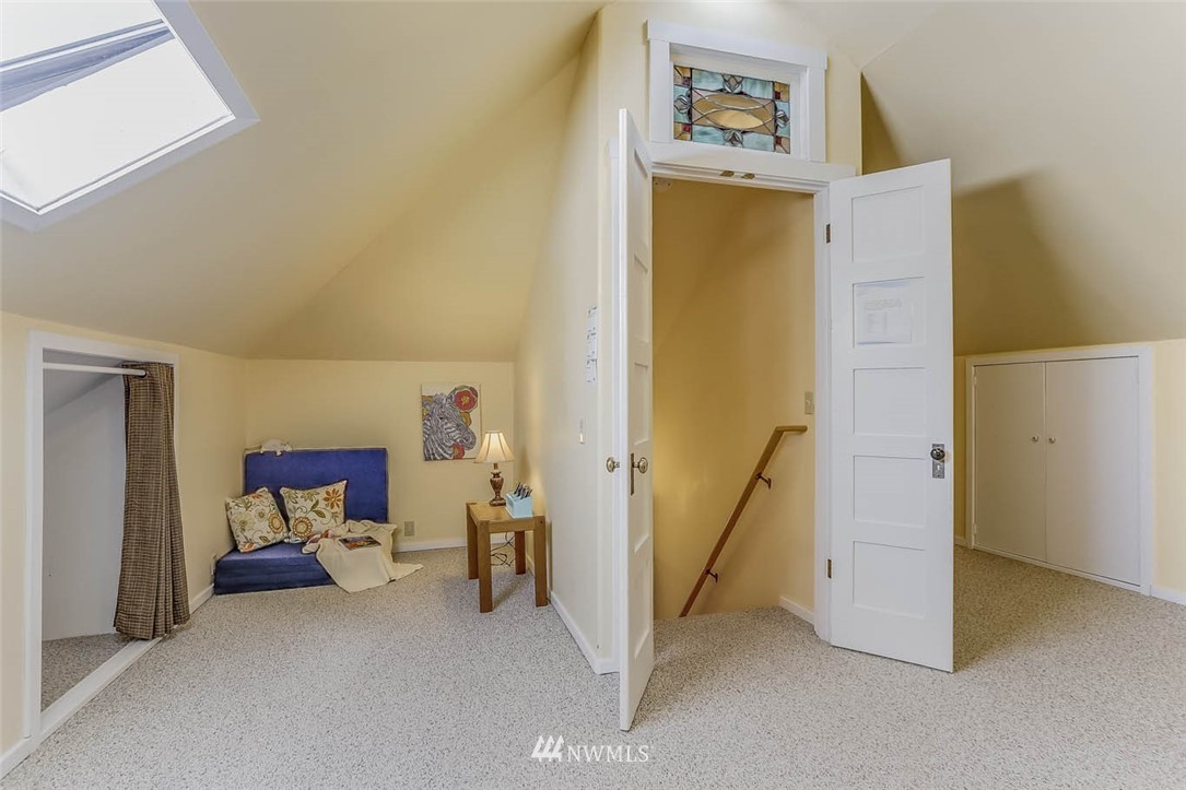 18518 103rd Avenue Northeast Bothell, WA 98011 - Photo 20 of 31 a view of room with furniture and a hallway