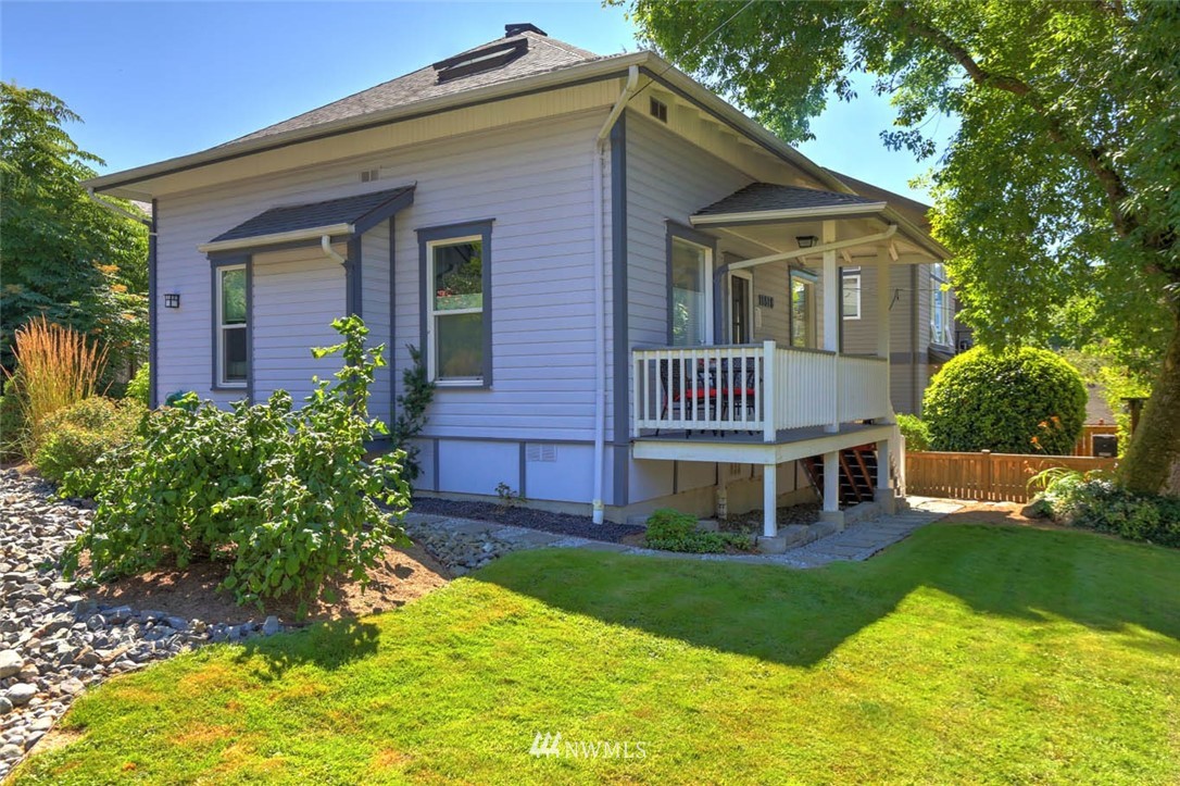 18518 103rd Avenue Northeast Bothell, WA 98011 - Photo 3 of 31 a front view of a house with a yard
