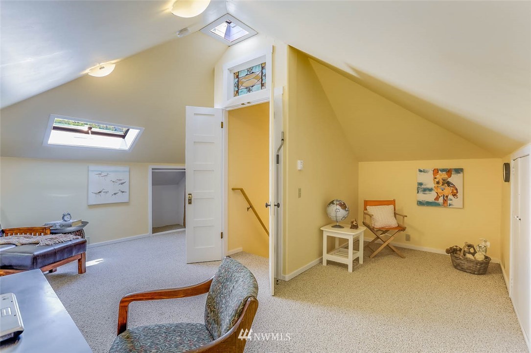 18518 103rd Avenue Northeast Bothell, WA 98011 - Photo 21 of 31 a bedroom with furniture and a gym equipment