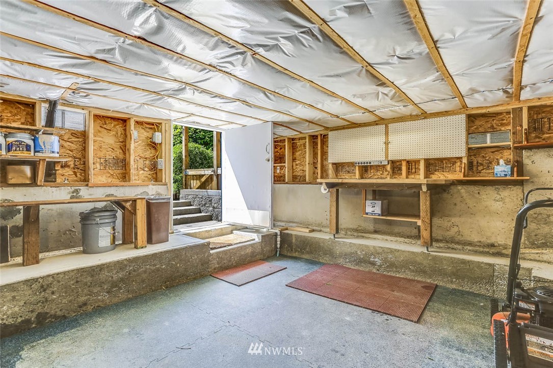18518 103rd Avenue Northeast Bothell, WA 98011 - Photo 23 of 31 a view of a kitchen with a sink and cabinets