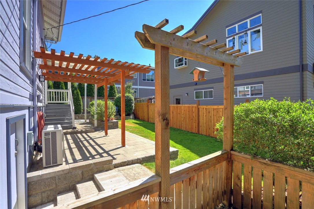 18518 103rd Avenue Northeast Bothell, WA 98011 - Photo 25 of 31 a view of a porch with furniture and garden