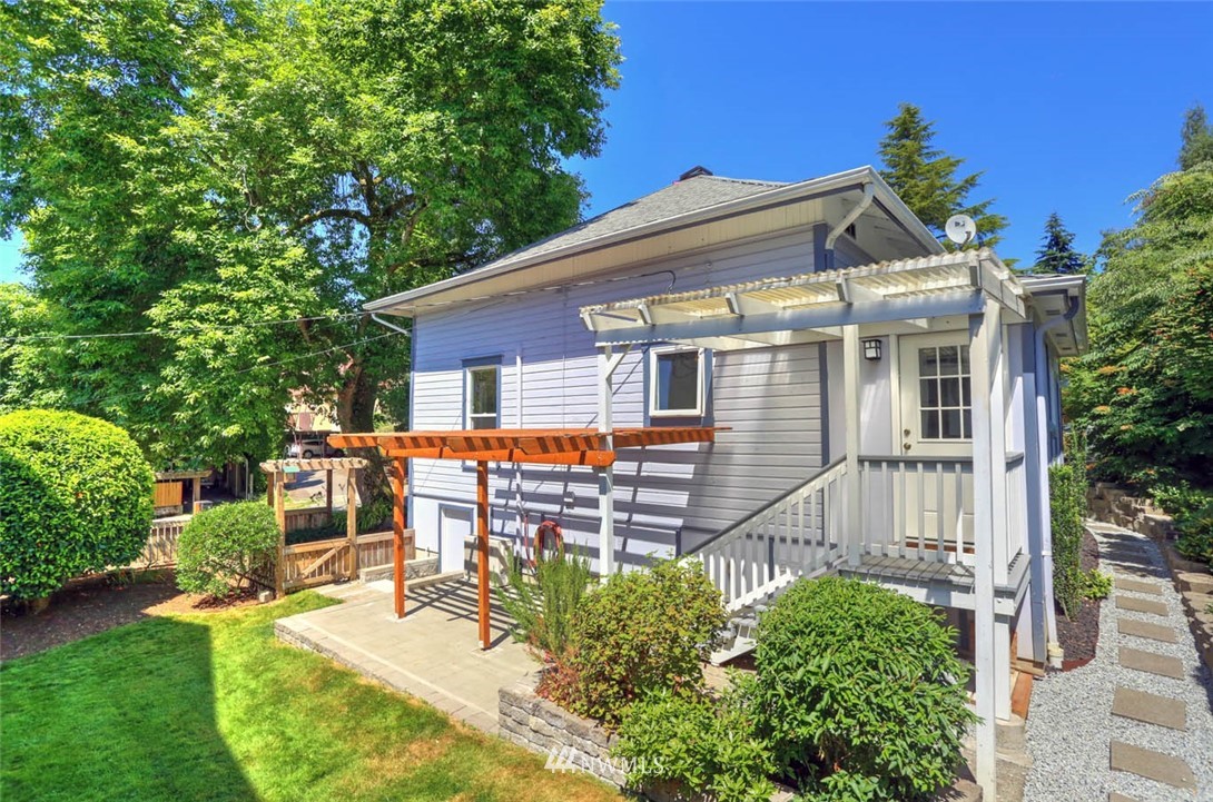 18518 103rd Avenue Northeast Bothell, WA 98011 - Photo 27 of 31 a view of a house with backyard and sitting area