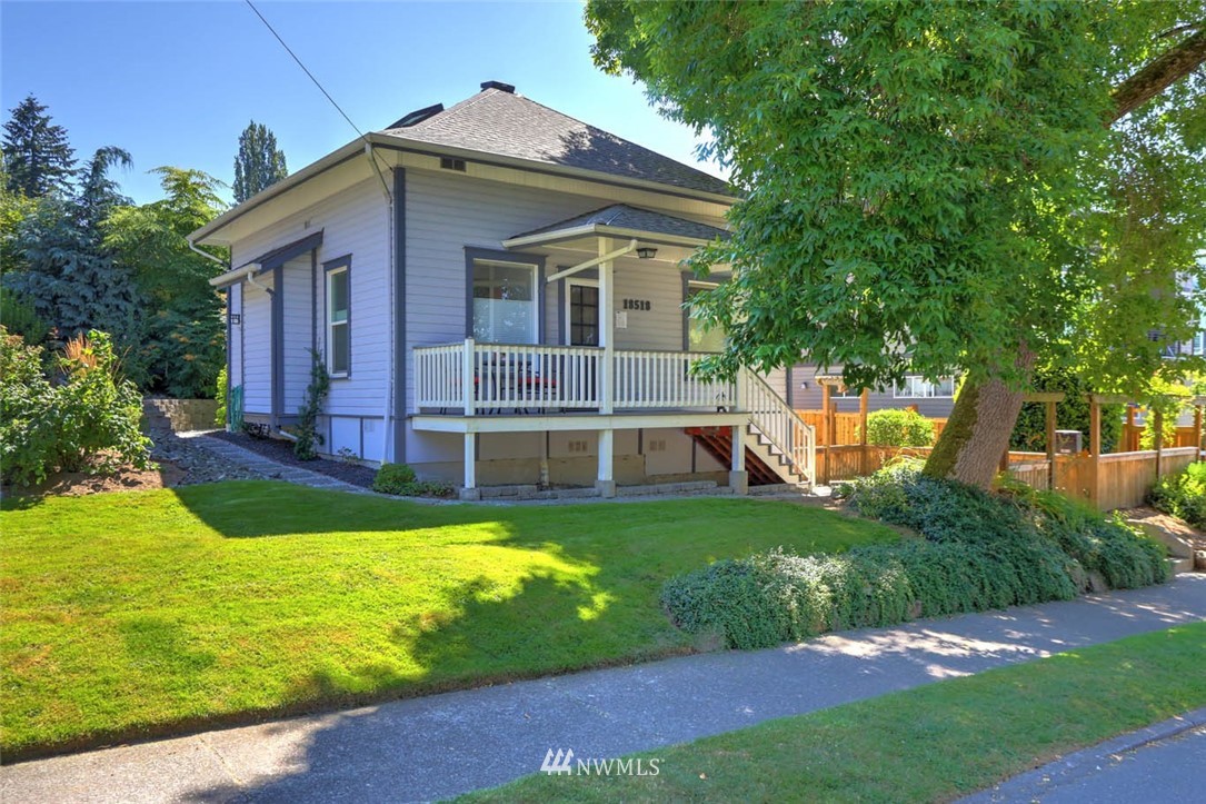 18518 103rd Avenue Northeast Bothell, WA 98011 - Photo 31 of 31 a view of a house with a yard patio and a small yard