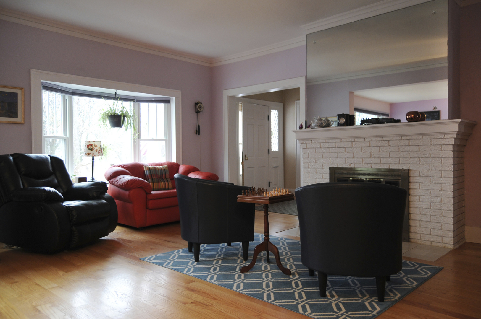 280 Fairbank Road Riverside, IL 60546 - Photo 3 of 33 a living room with furniture and a fireplace