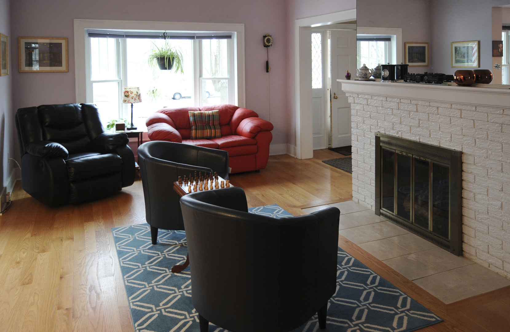 280 Fairbank Road Riverside, IL 60546 - Photo 4 of 33 a living room with furniture and a fireplace