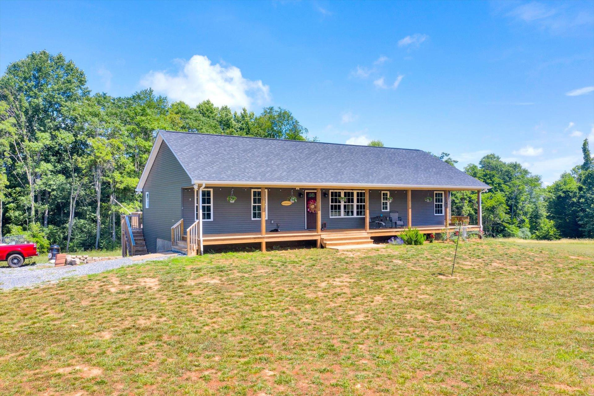 3294 Ayers Road Moneta, VA 24121 - Photo 1 of 41 a house with swimming pool in front of it