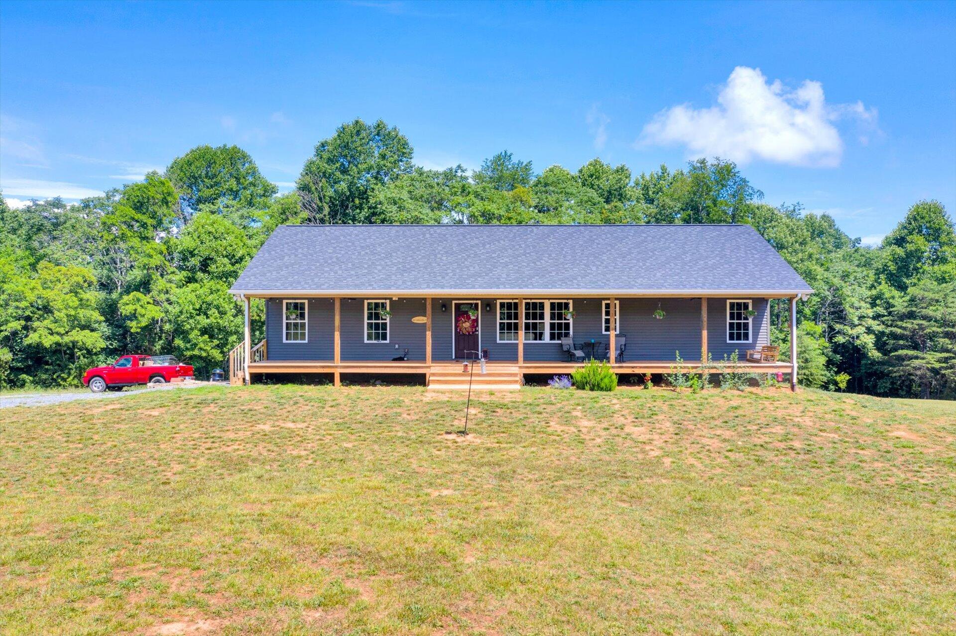 3294 Ayers Road Moneta, VA 24121 - Photo 2 of 41 a front view of a house with swimming pool