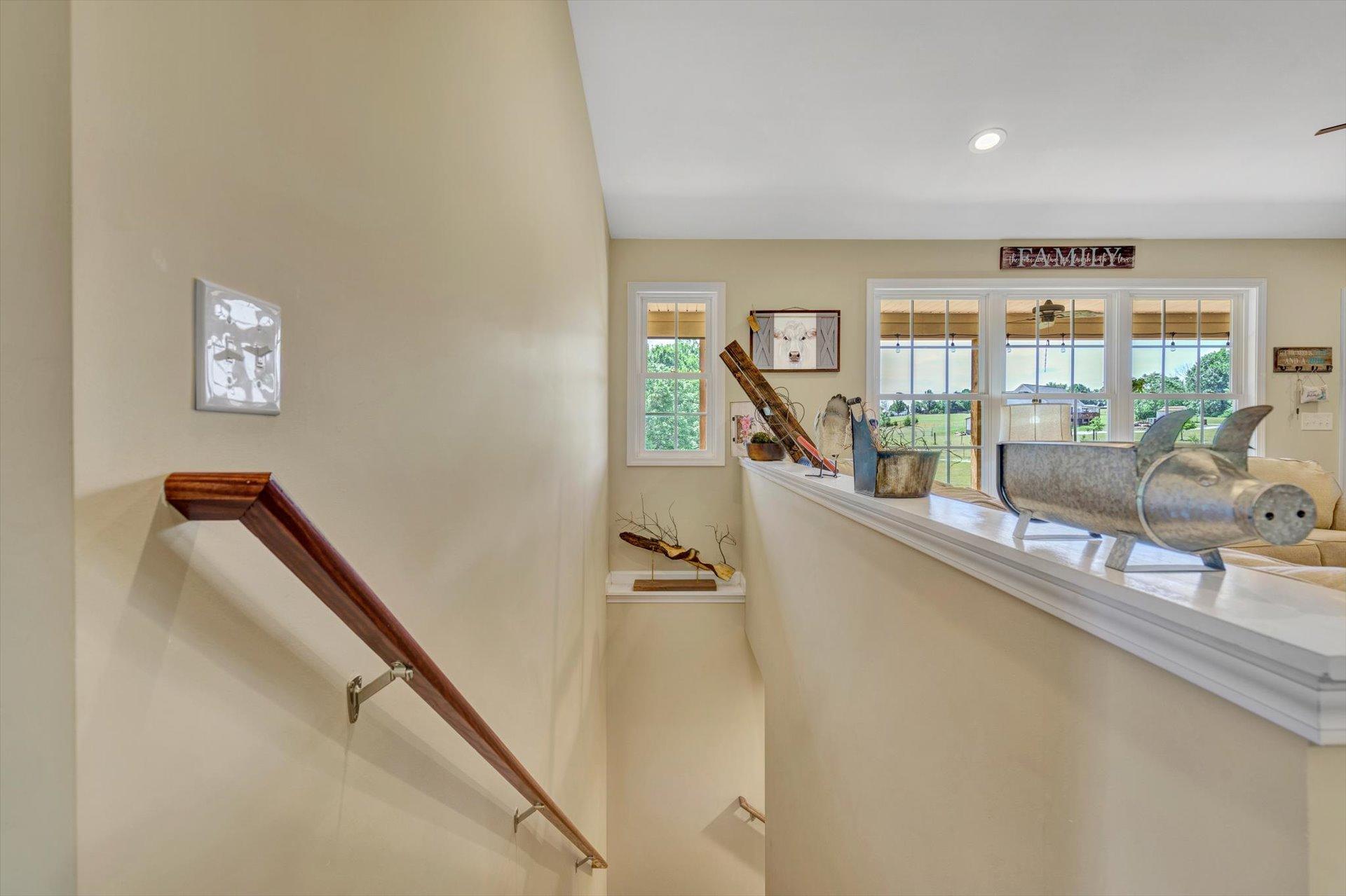 3294 Ayers Road Moneta, VA 24121 - Photo 23 of 41 a dining room with furniture and a floor to ceiling window