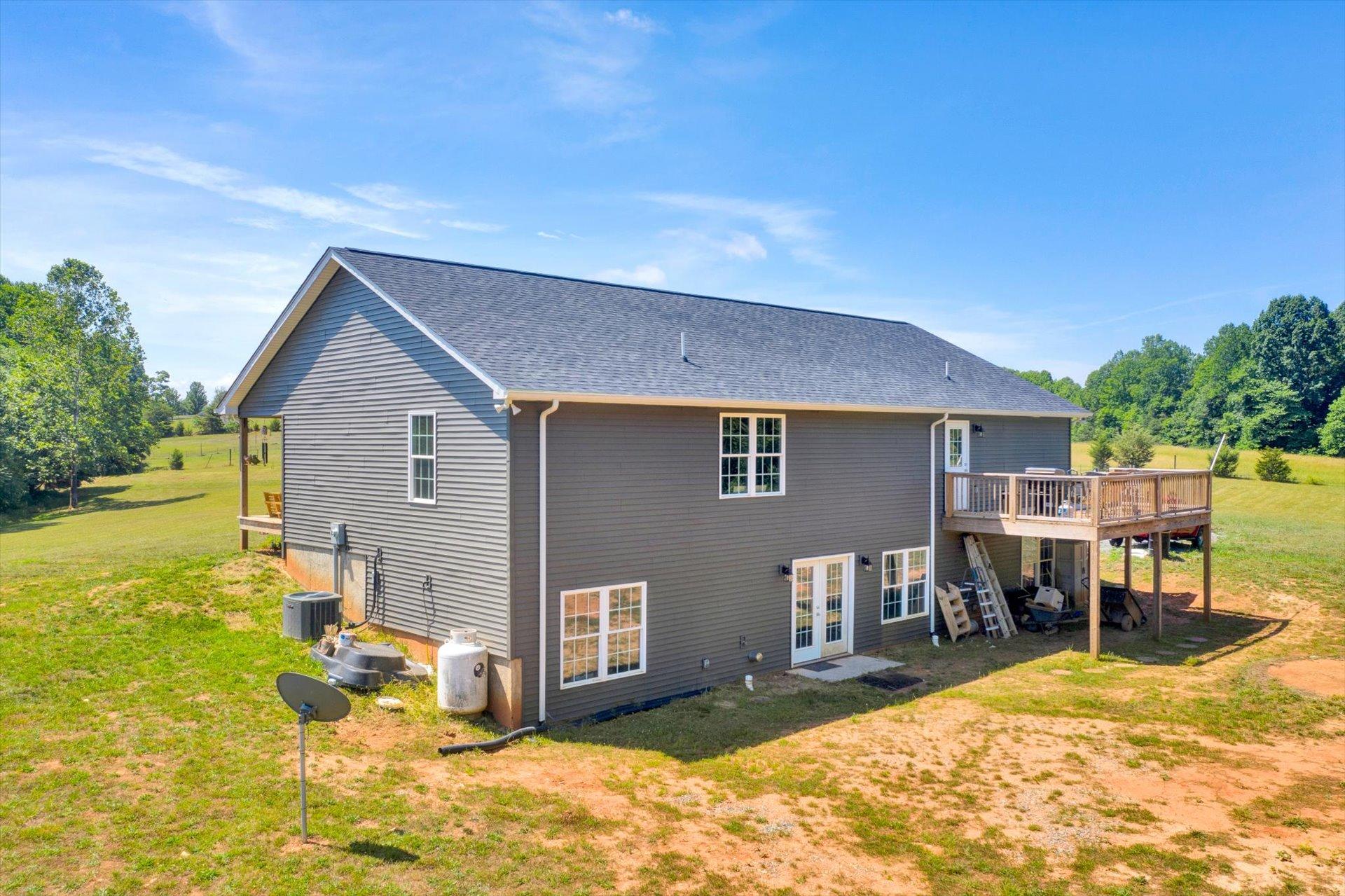 3294 Ayers Road Moneta, VA 24121 - Photo 28 of 41 a view of a house with a patio