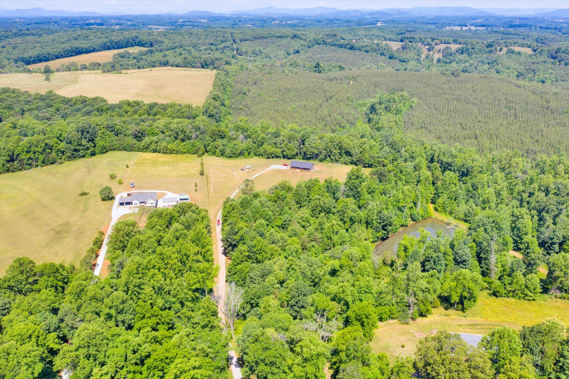 3294 Ayers Road Moneta, VA 24121 - Photo 31 of 41 an aerial view of residential houses with outdoor space and trees all around