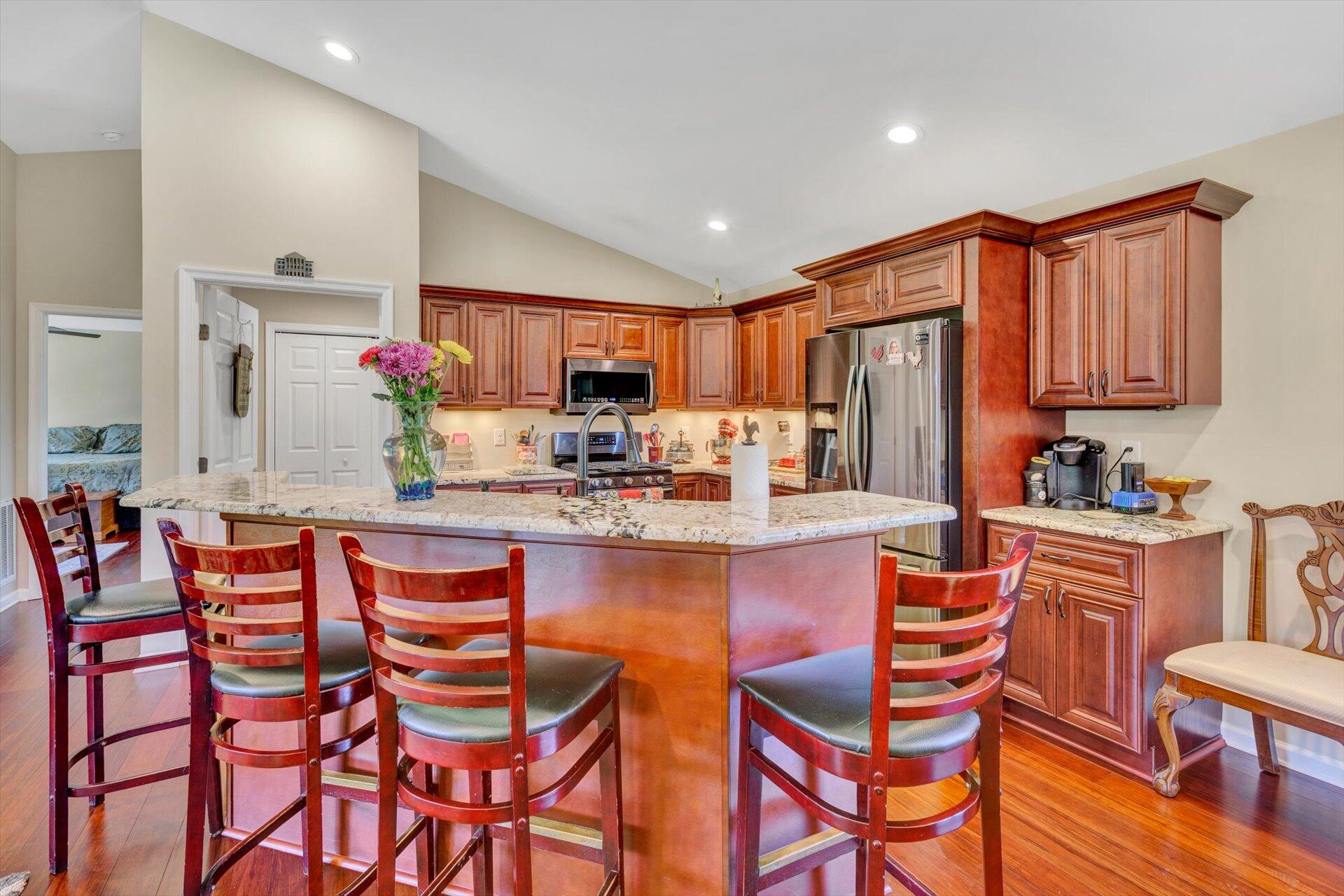 3294 Ayers Road Moneta, VA 24121 - Photo 7 of 41 a dining table and chairs in a kitchen