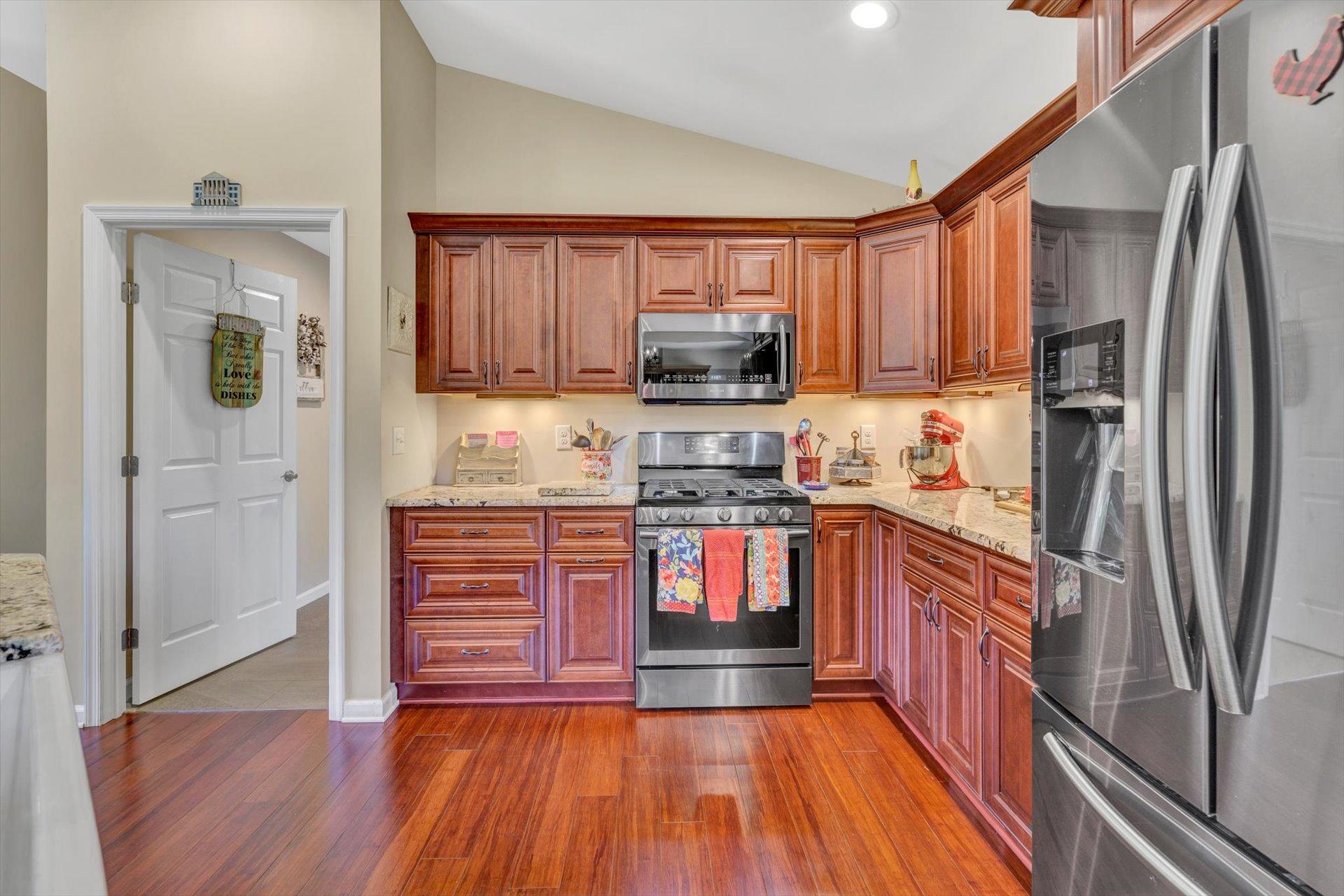 3294 Ayers Road Moneta, VA 24121 - Photo 10 of 41 a kitchen with stainless steel appliances granite countertop a refrigerator and a stove top oven