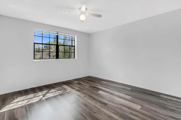 an empty room with windows