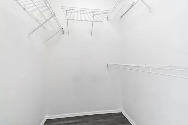 a view of a room with racks on the wall