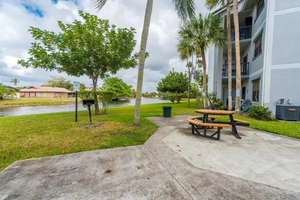 a park with bench and trees