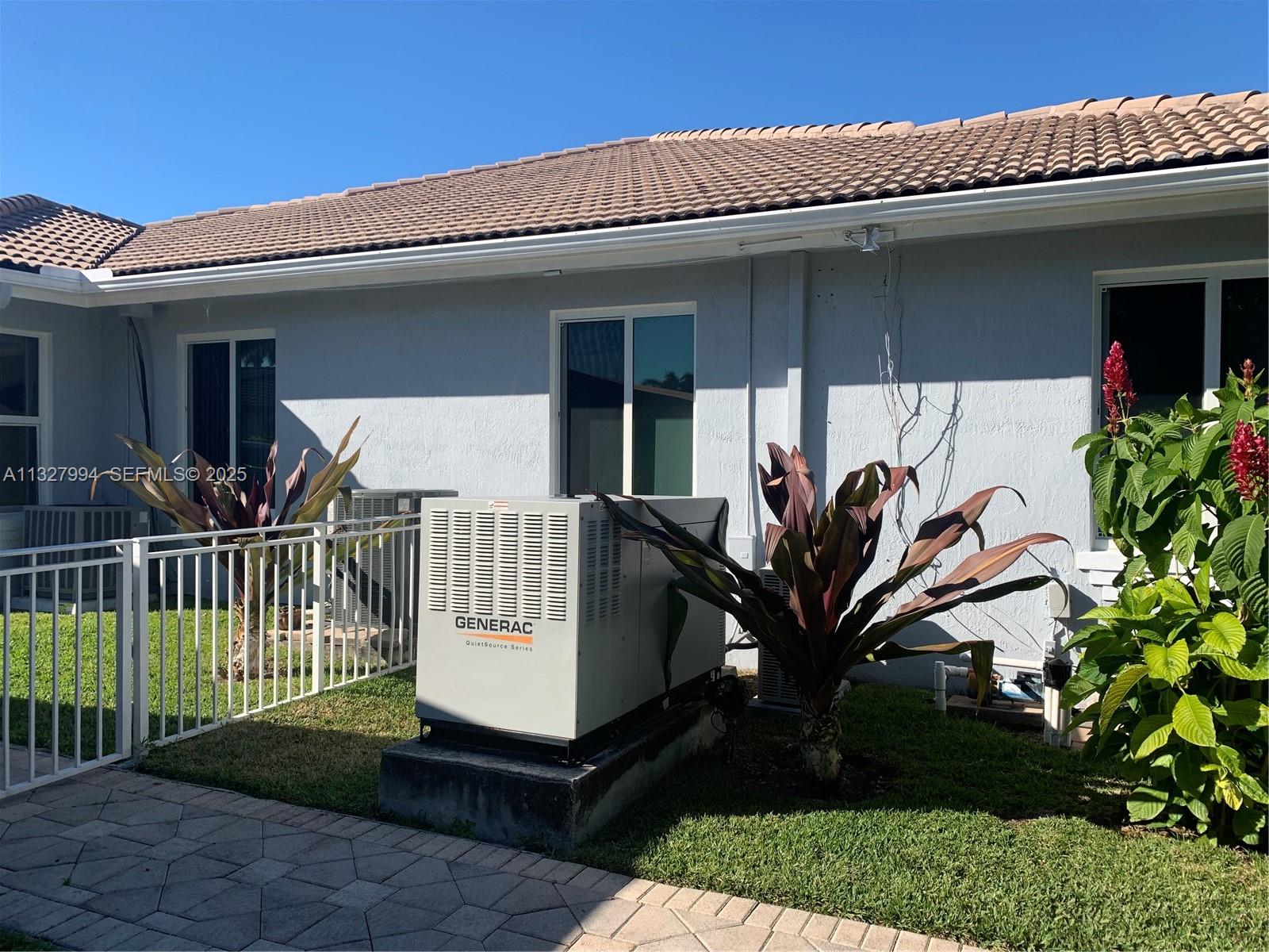 7625 Southwest 75th Avenue Miami, FL 33143 - Photo 19 of 43 Side View Including Quiet Series Generac 36kw Generator