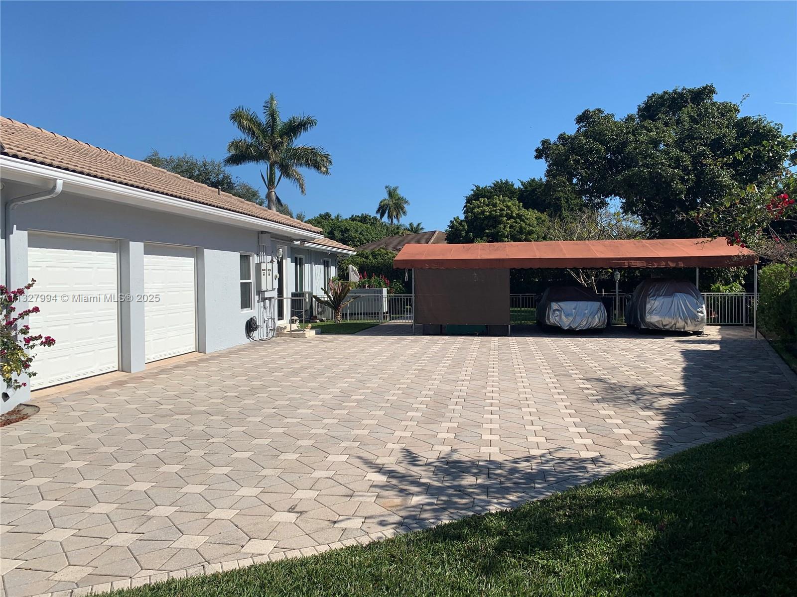 7625 Southwest 75th Avenue Miami, FL 33143 - Photo 20 of 43 Two Car Garage and Awning covered Carport