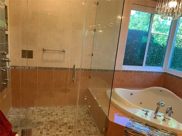 a bathroom with a sink vanity and a mirror