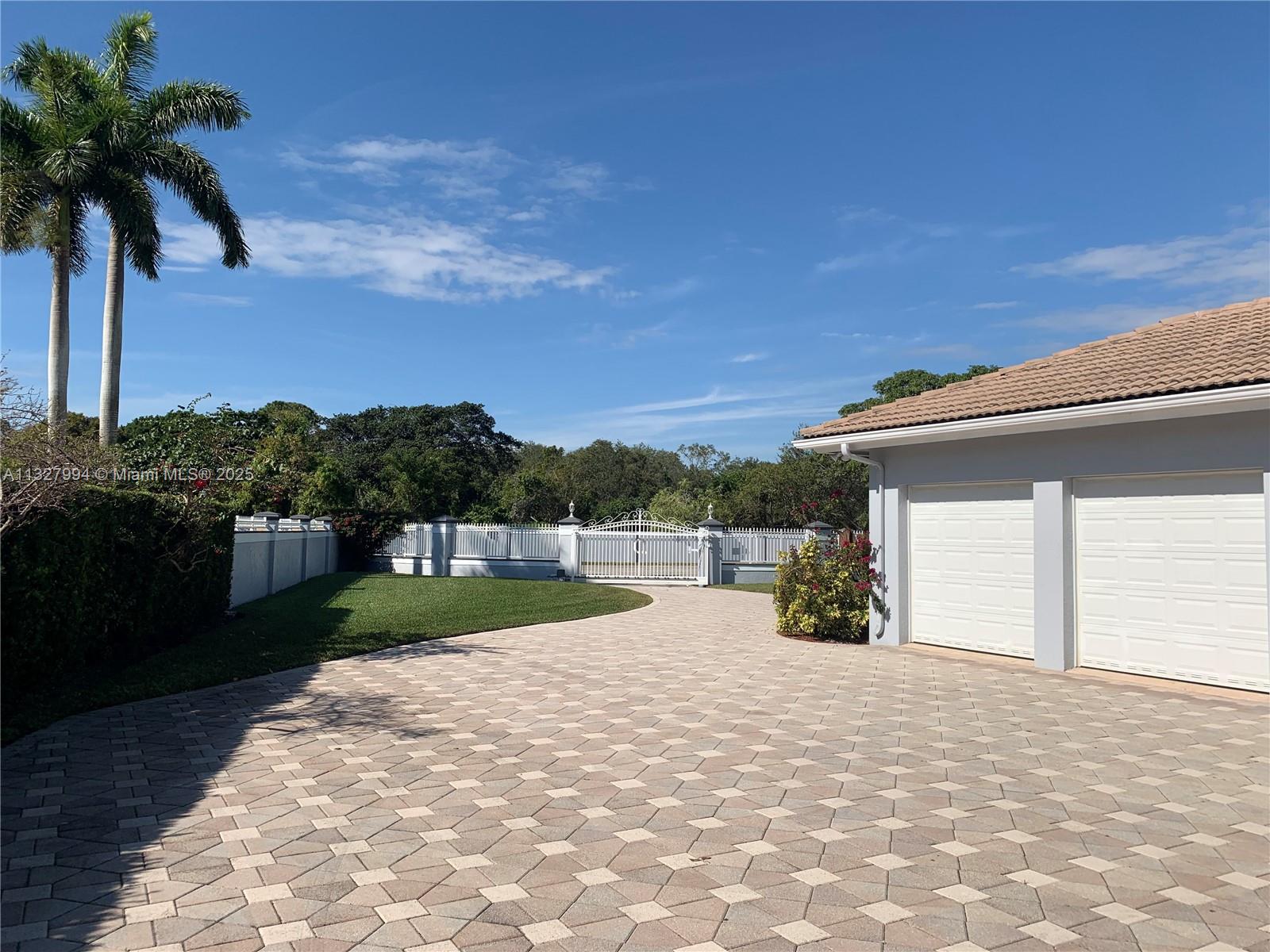 7625 Southwest 75th Avenue Miami, FL 33143 - Photo 5 of 43 Side View/Garages