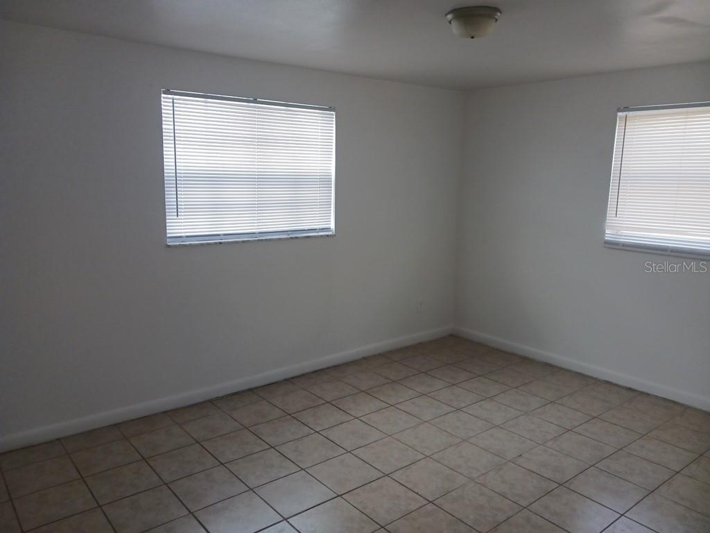 3432 Thorny Ridge Drive Holiday, FL 34691 - Photo 2 of 12 an empty room with a window
