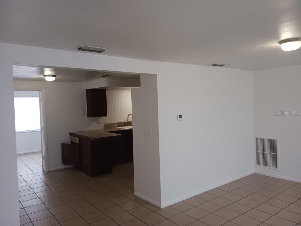 3432 Thorny Ridge Drive Holiday, FL 34691 - Photo 9 of 12 a view of kitchen with microwave and cabinets