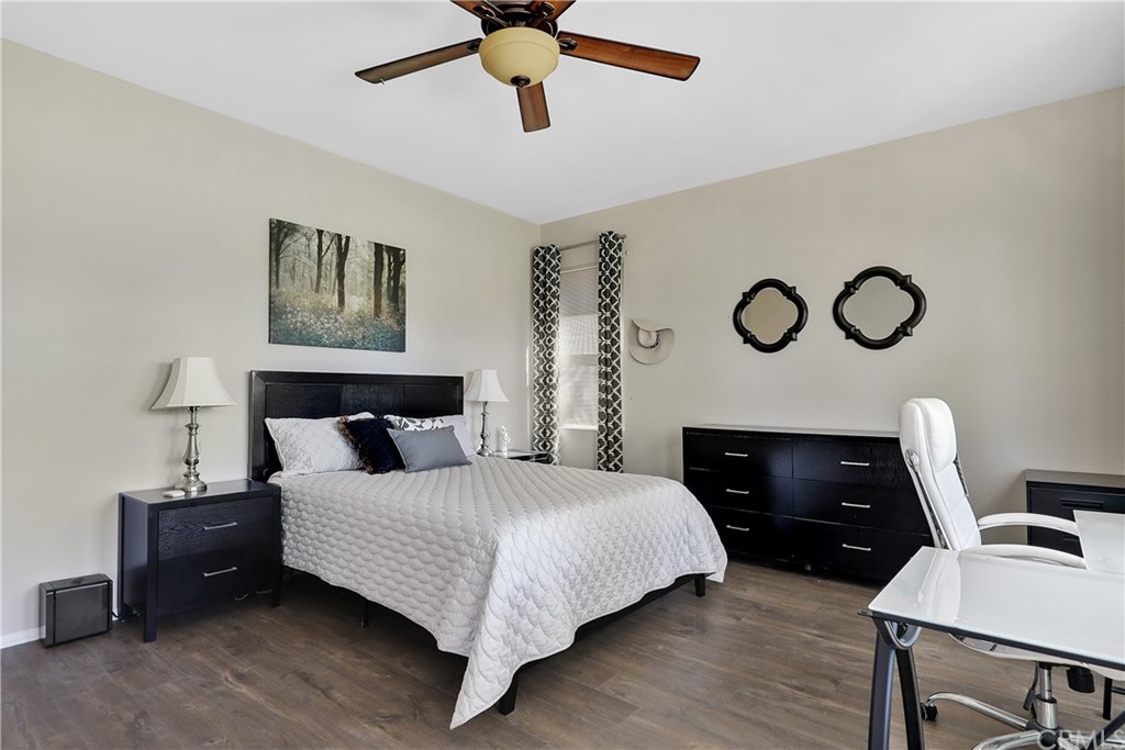 82551 Grant Drive Indio, CA 92201 - Photo 17 of 45 a bedroom with a bed and a table