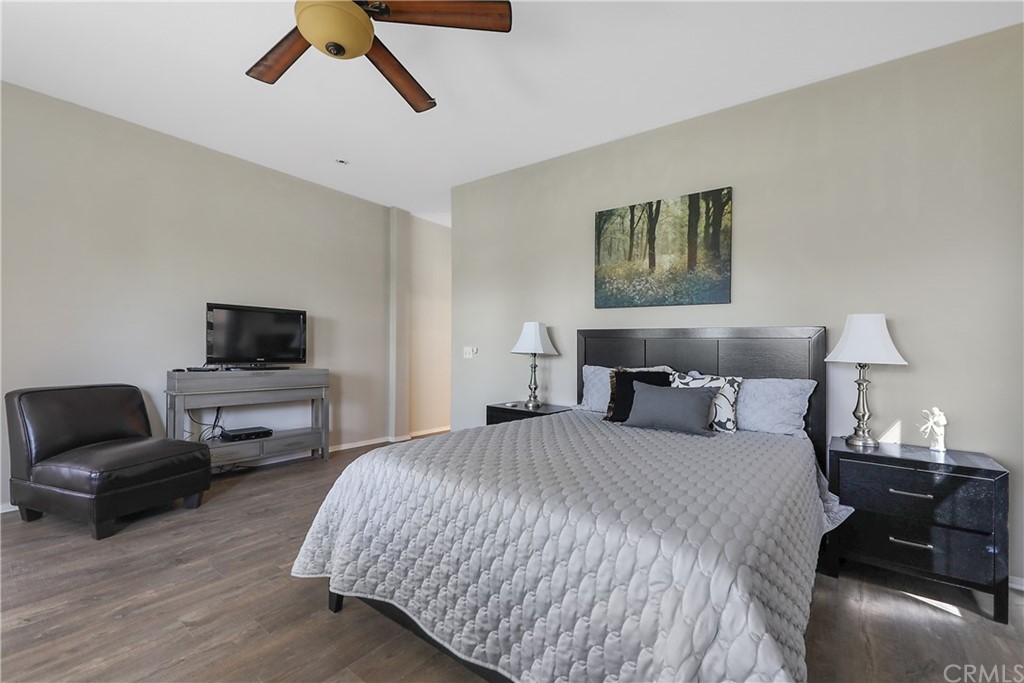 82551 Grant Drive Indio, CA 92201 - Photo 18 of 45 a bedroom with a bed and a couch